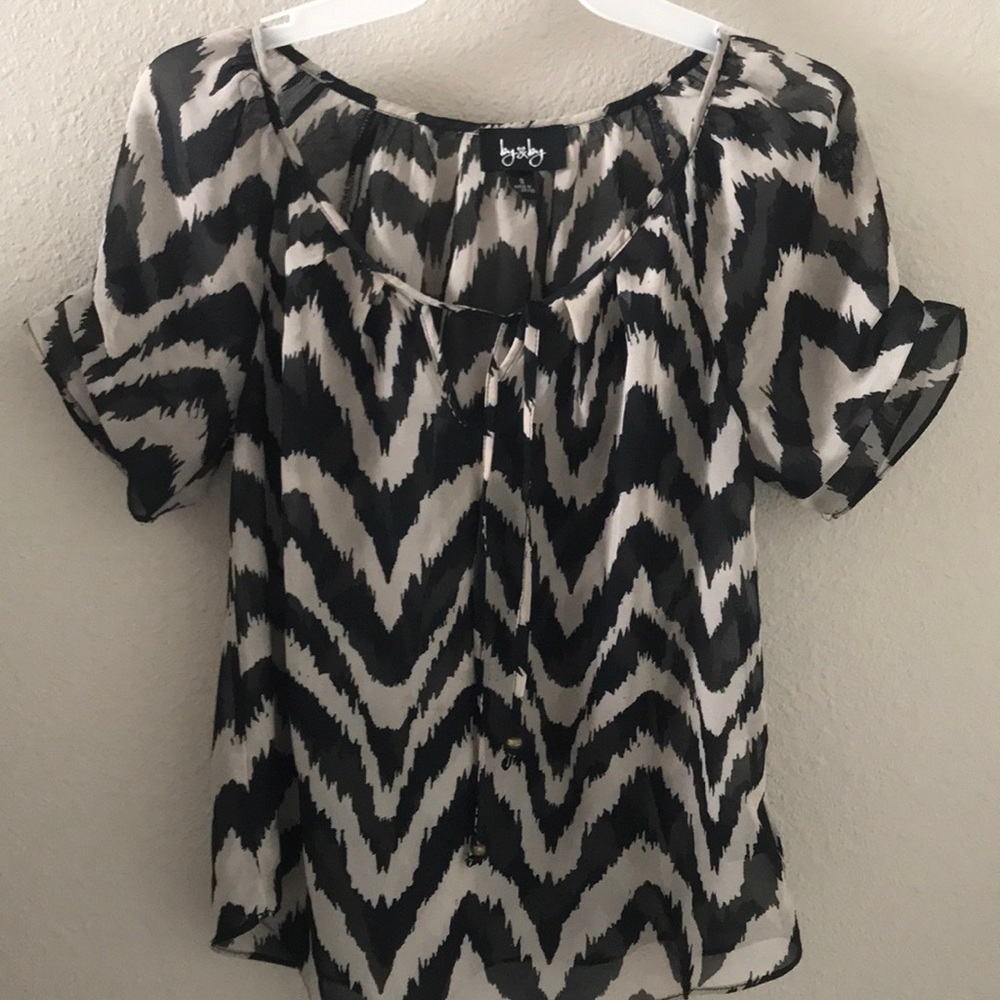 Black and beige/cream top